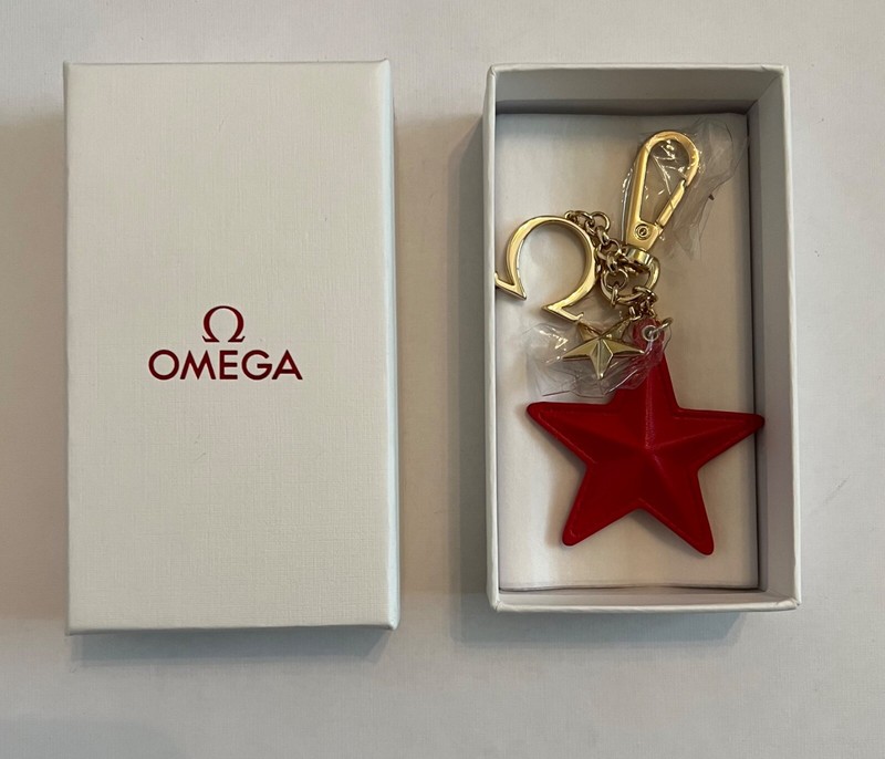 NEW OEM OMEGA Limited Edition Purse Charm Keychain Star Constellation Red Gold