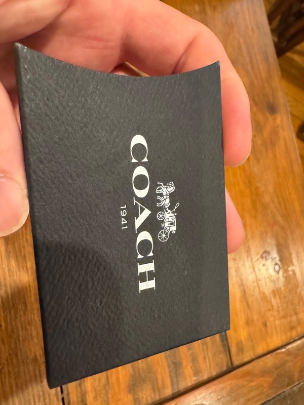 authentic Coach leather booklet + certificate of authenticity + sleeve fashion gallery